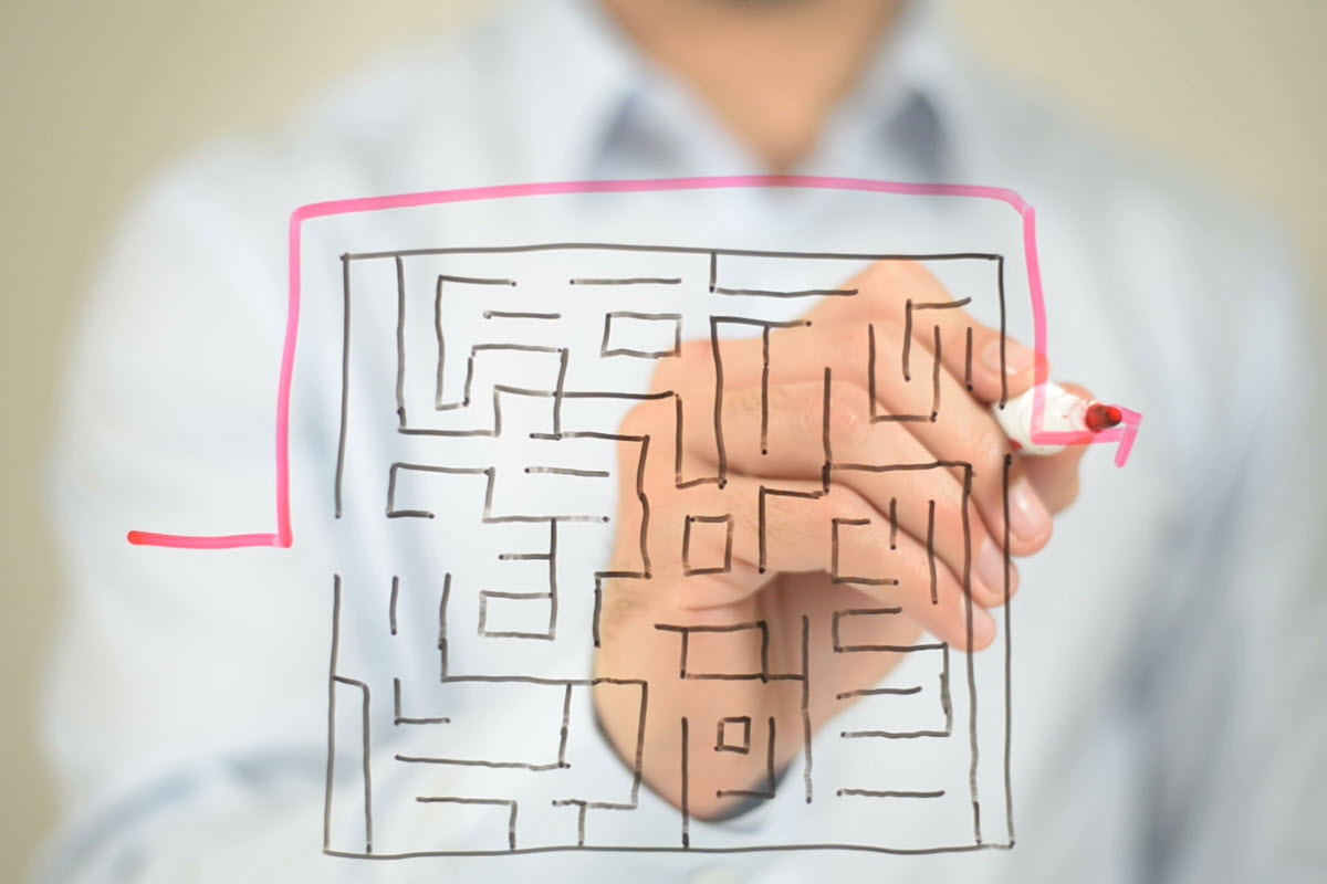 Illustration of a business maze with a shortcut, representing Six Sigma shortcuts.