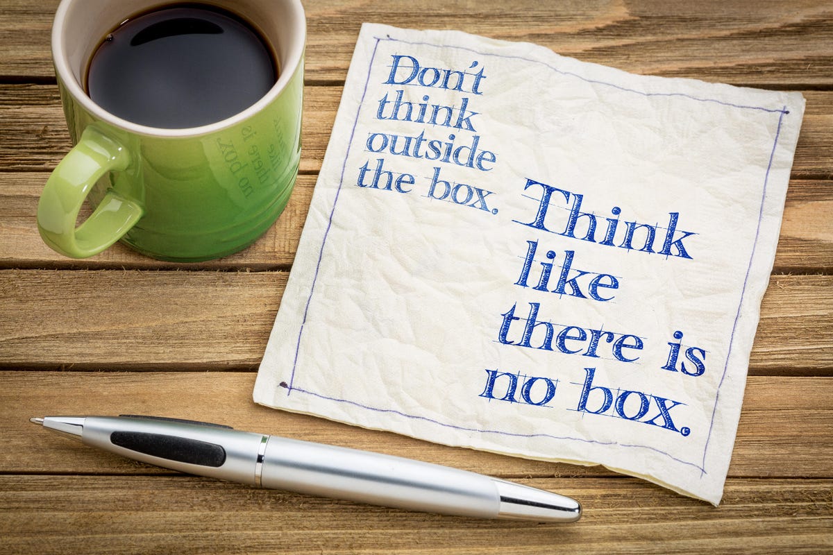 A napkin with the note "Think outside the box"