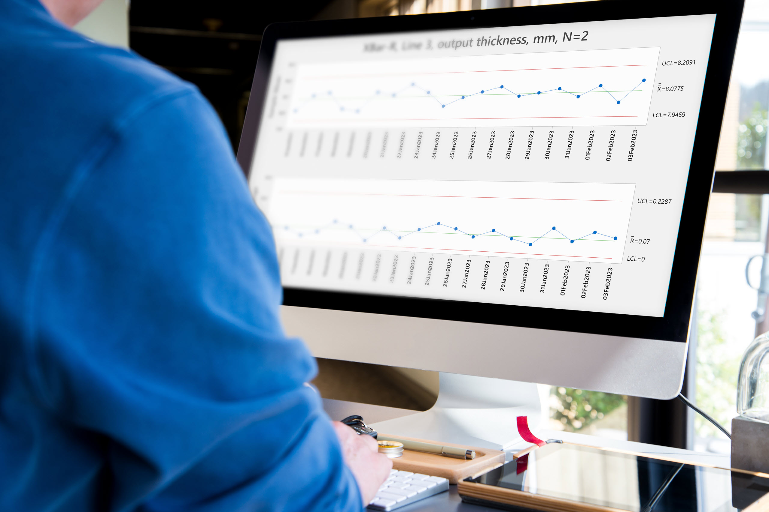 Student analyzing an Xbar-R Control chart